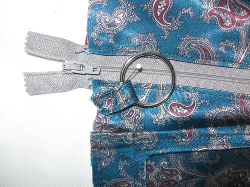 baste key ring in place