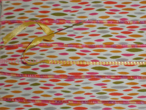 weave ribbon into stitches