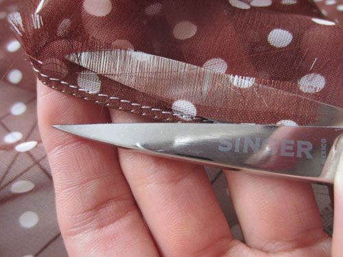 trim away excess fabric