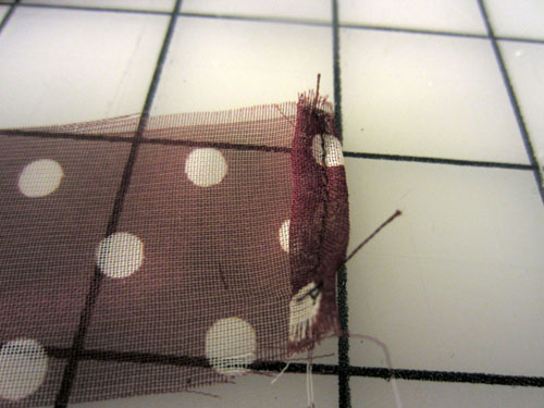 hemmed casing end