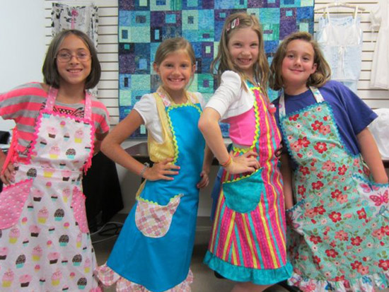 elegant stitches camp - aprons 550px