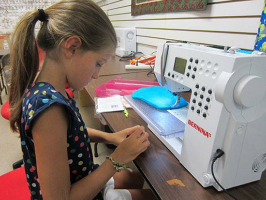elegant stitches camp - sewing on activa 550px