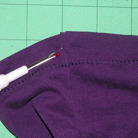t-shirt drawstring bag - cut holes in shirt hem casing