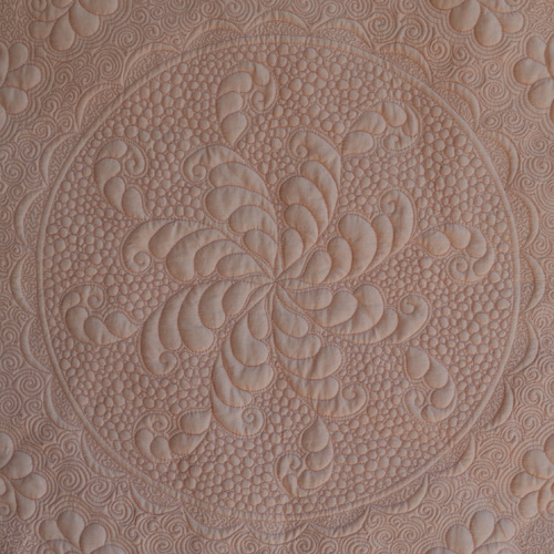 Renae Allen's Quartro Decennie quilt - close-up of fill stitches.