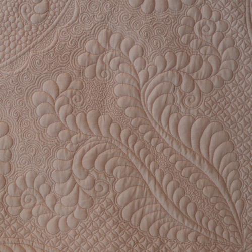 Renae Allen's Quartro Decennie wholecloth quilt.