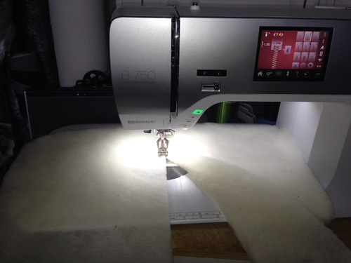 stitching batting scraps together