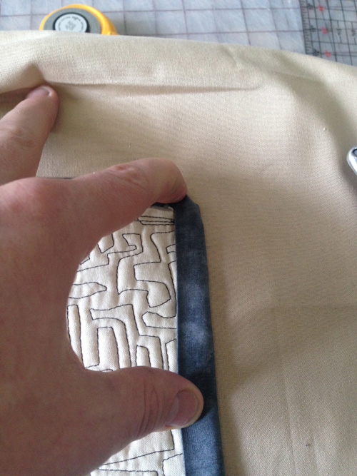 fold the binding to the back