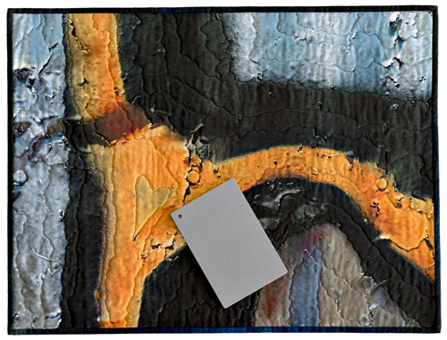 digital gray card on quilt