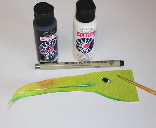paint the stork face with acrylic paint