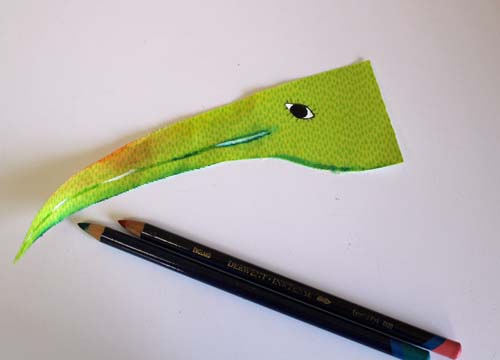 shade the beak with Inktense pencils