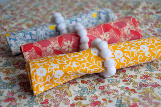 calico napkins, pom-pom napkin rings