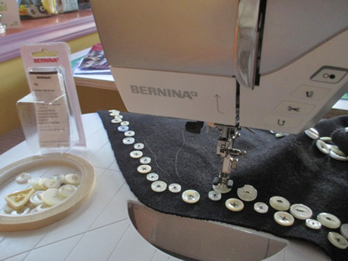 Georgia Bonesteel sewing on buttons on her BERNINA machine