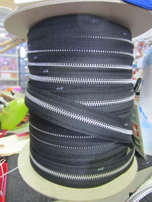 reel of black zipper tape