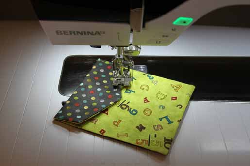 topstitch the pocket flap in place