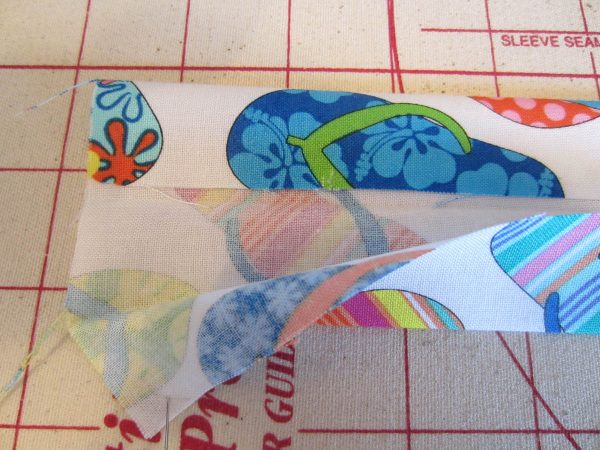 Swim Wetbag Sewing Tutorial - 5. Fold 4 x 18” strip in half lengthwise