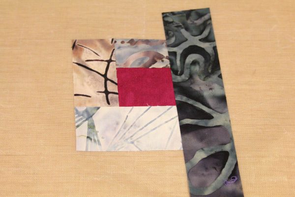 Fused Log Cabin Table Runner Tutorial - Place strip along the right edge