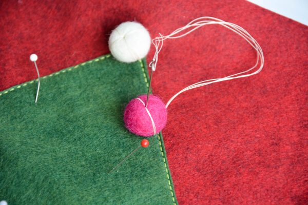 Christmas Tree Pillow Tutorial - attach pom pom