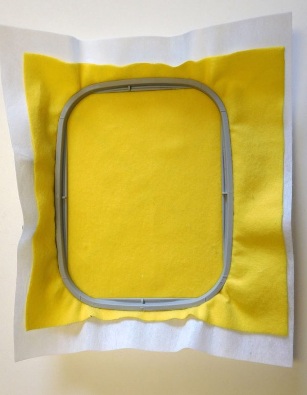 Embroidery hooping tip