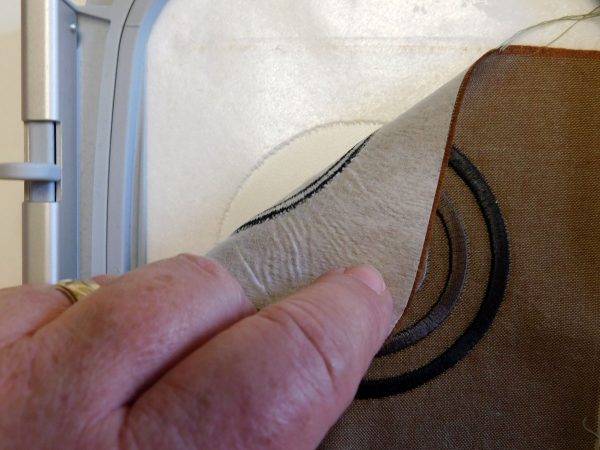 Embroidery hooping tip