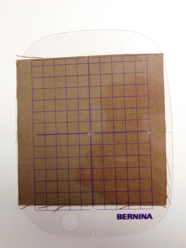 Embroidery hooping tip