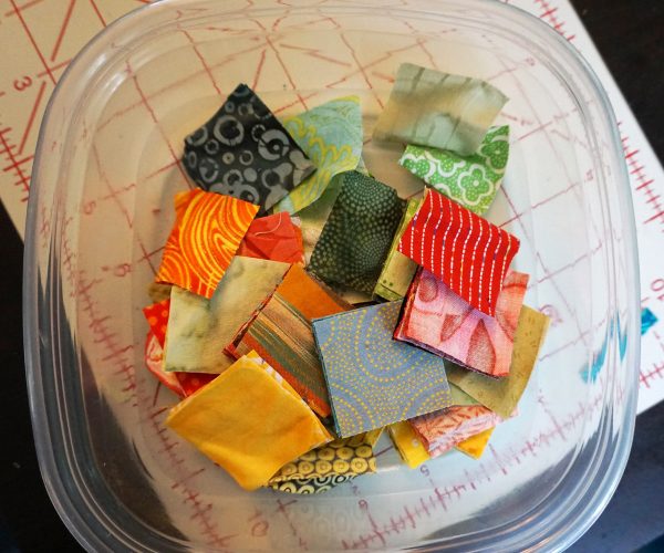 Postage stamp patchwork pillow
