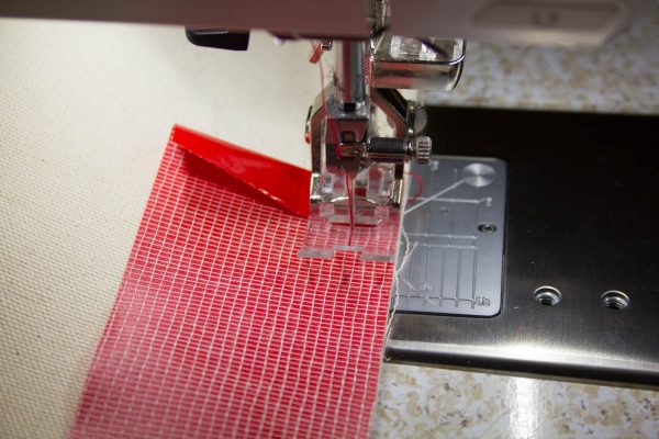 Oilcloth-lined Garden Tote Tutorial - sew the binding strip to the top edge of the bag