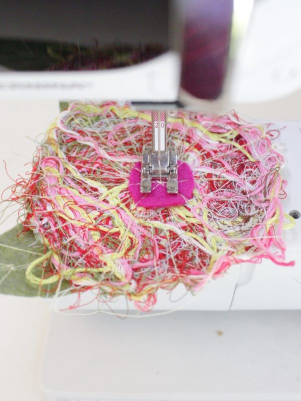 Recycled thread flower pin Step Nine: sew the center of the flower