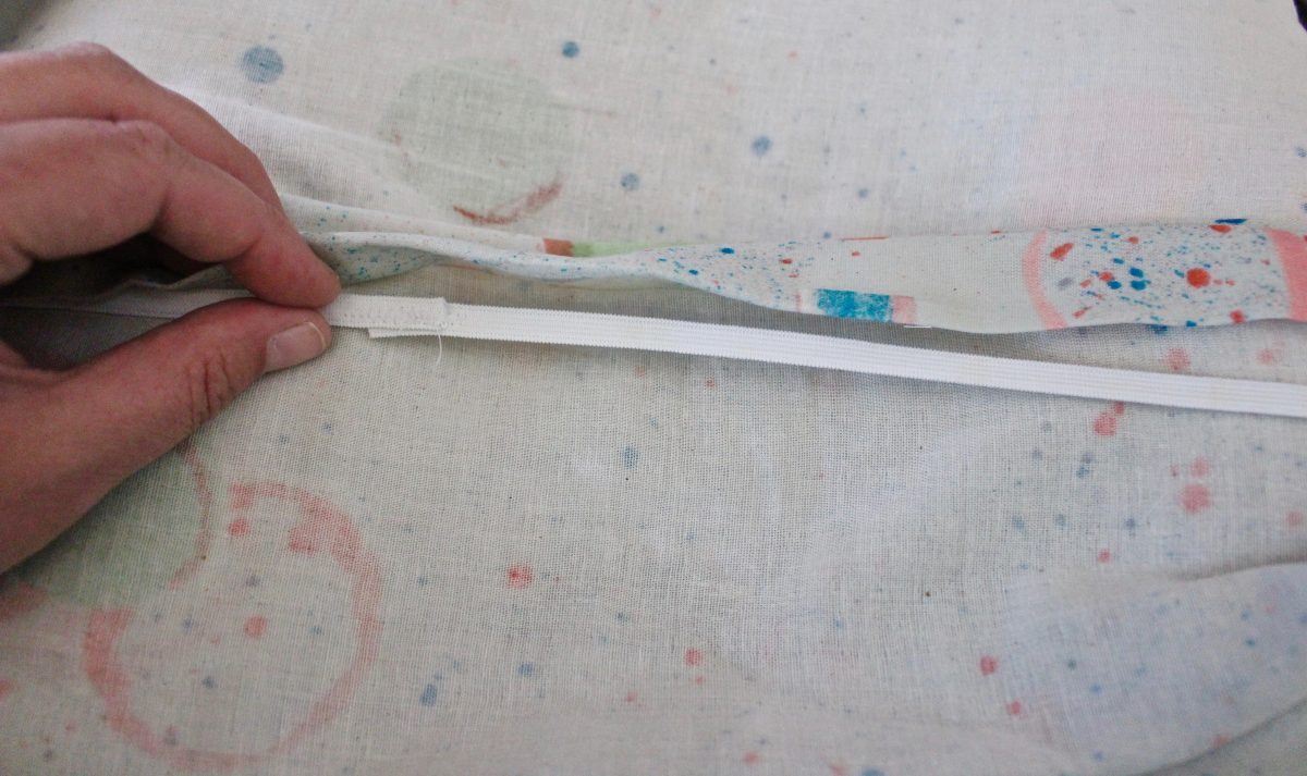 step thirteen: insert elastic and sew the top fold