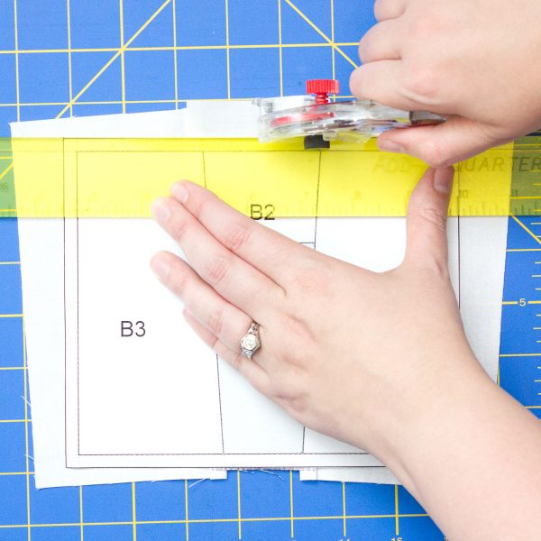 Get Happy Quilt Step Fifteen: Trim along outer border