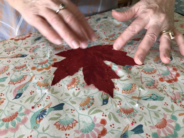 position the cut Maple leaf