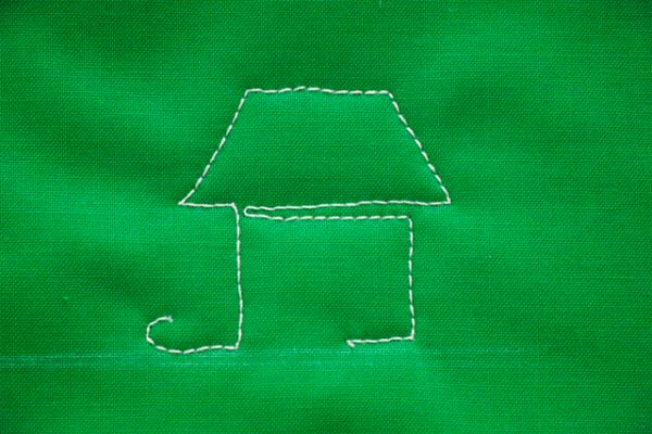 FMQ cabin in the woods - stitching down to the baseline