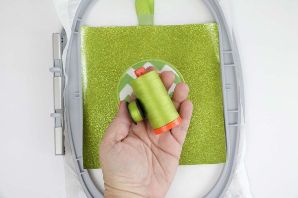 Shamrock door hanger in the hoop Step 7, Attach Back: wind matching bobbin and thread top and bobbin for outer running stitch