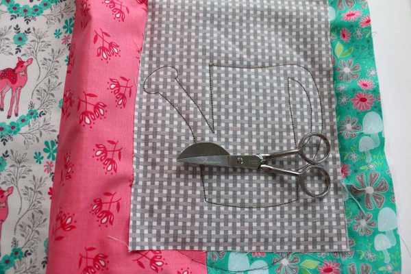 Step 6, Embroidering the Hello Spring Embroidered Pillow
