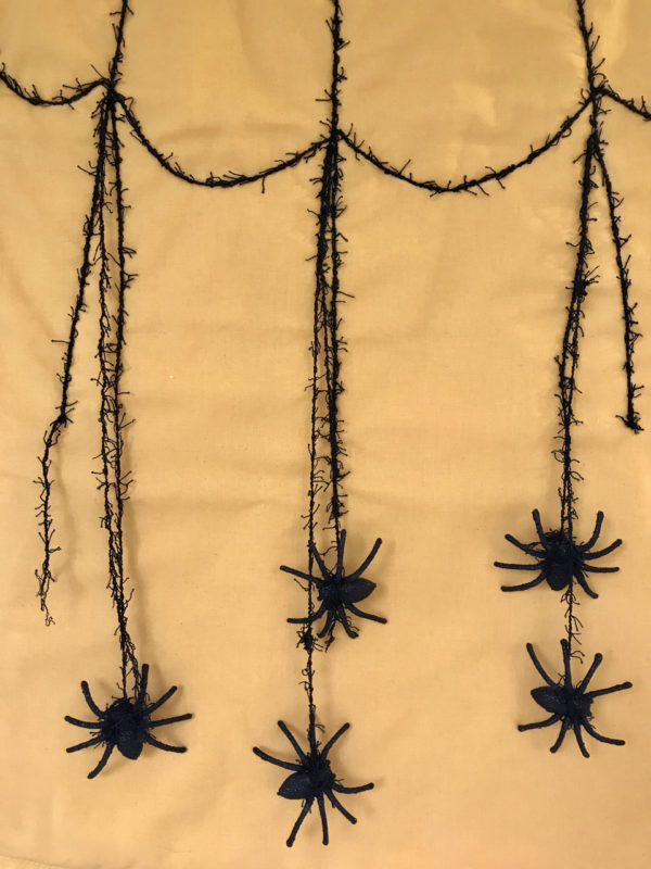 Spider Web Door Banner tutorial WeAllSew Blog - dangling spiders