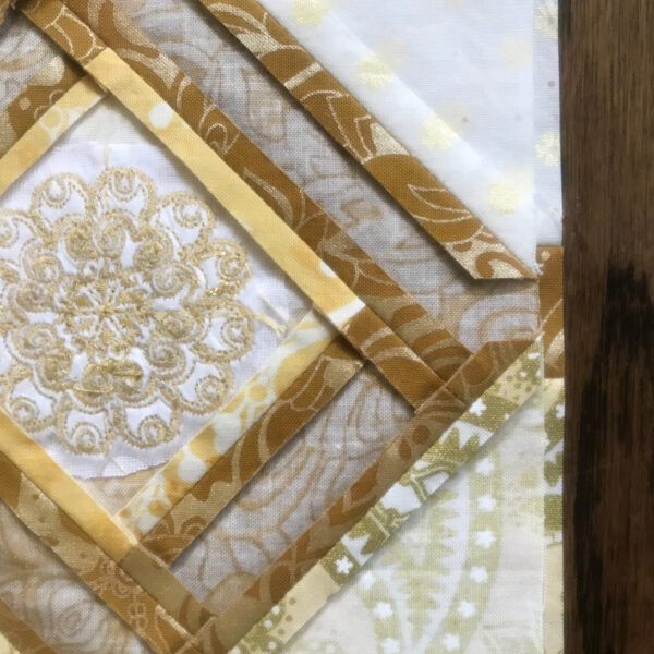 https://xsidsqvs.top/wp-content/uploads/sites/4/2018/12/125thAnniversaryQuilt_Month_5_Aligning_the_frame_work