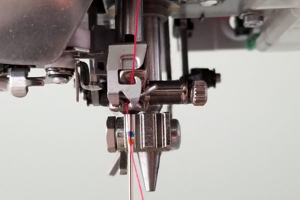 BERNINA_8_Series_Threading_10_Thread_behind_needle_clamp_guide_BERNINA_WeAllSew_Blog_1200x800px