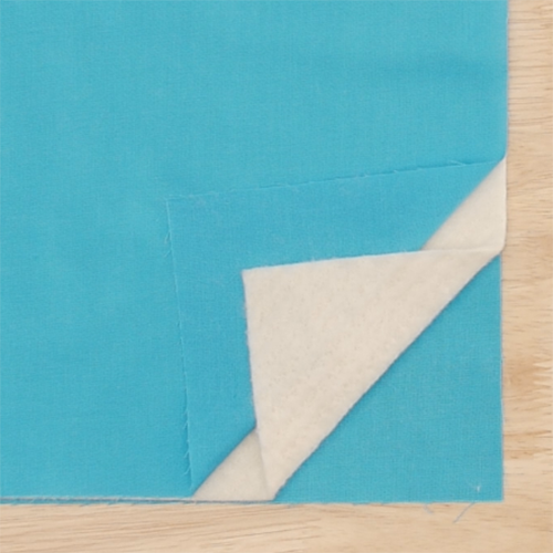 MTC_Leather_Roller_Foot_#55_01_Quilt_Sandwich_Low_Loft_Batting_BERNINA_WeAllSew_Blog_500x500px