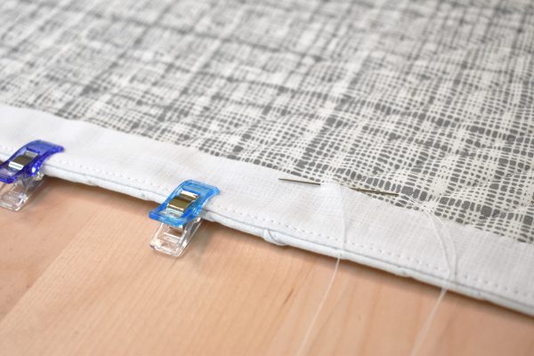 Hand stitch the facing