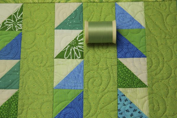 Allover texture motif with lightweight thread