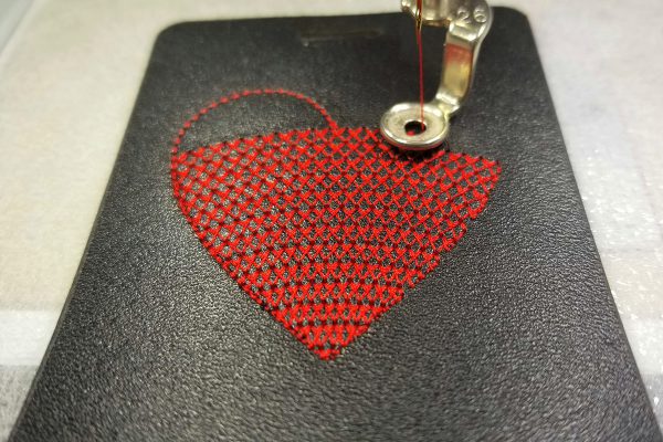 Embroidered_Luggage_Tag_19_Lacework_fill_with_wave_fill_effect_being_stitched_BERNINA_WeAllSew_Blog_1200x800px