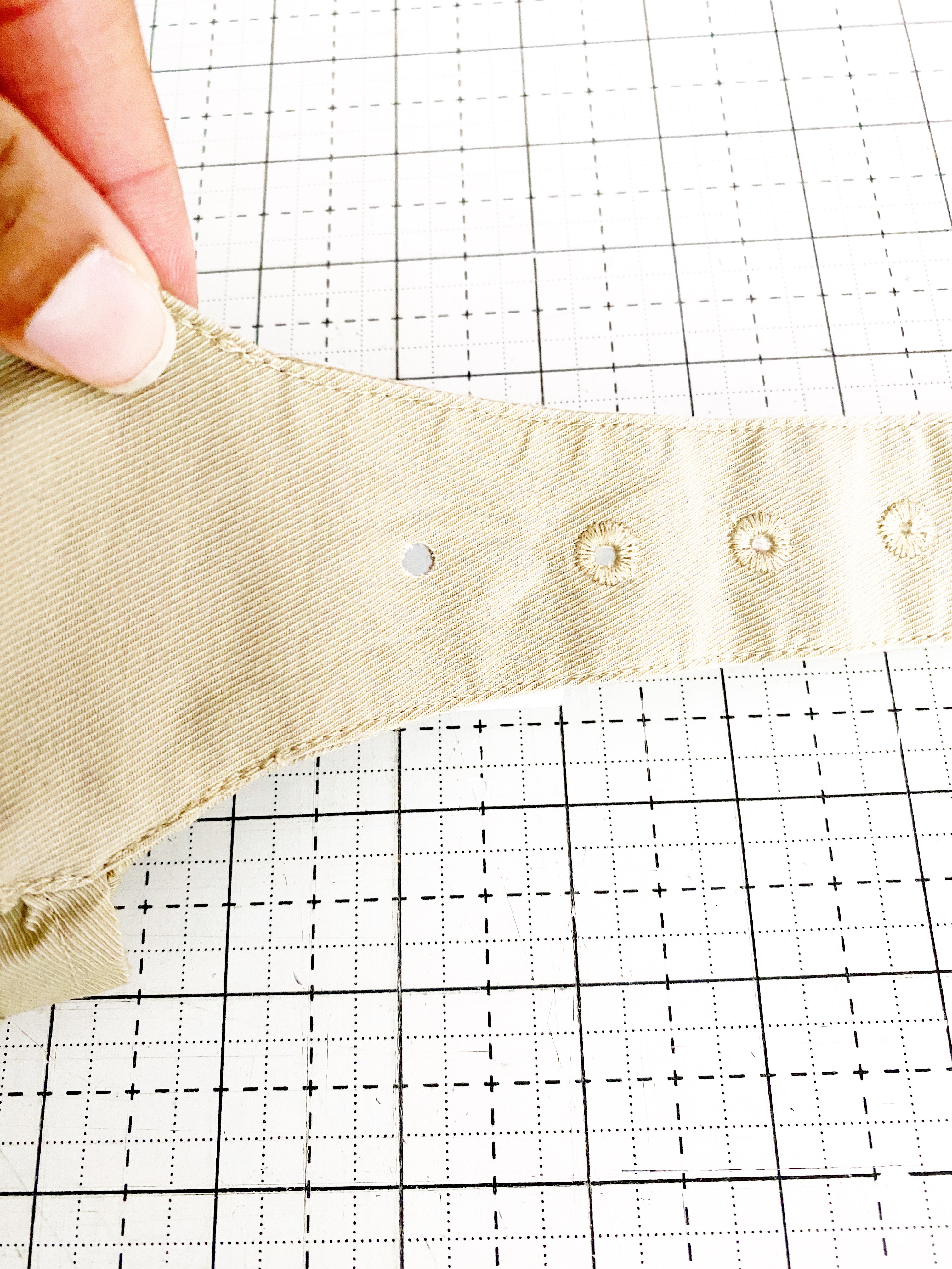 How To Add An Eyelet To Ready-Made Garment: Cut holes in the garment