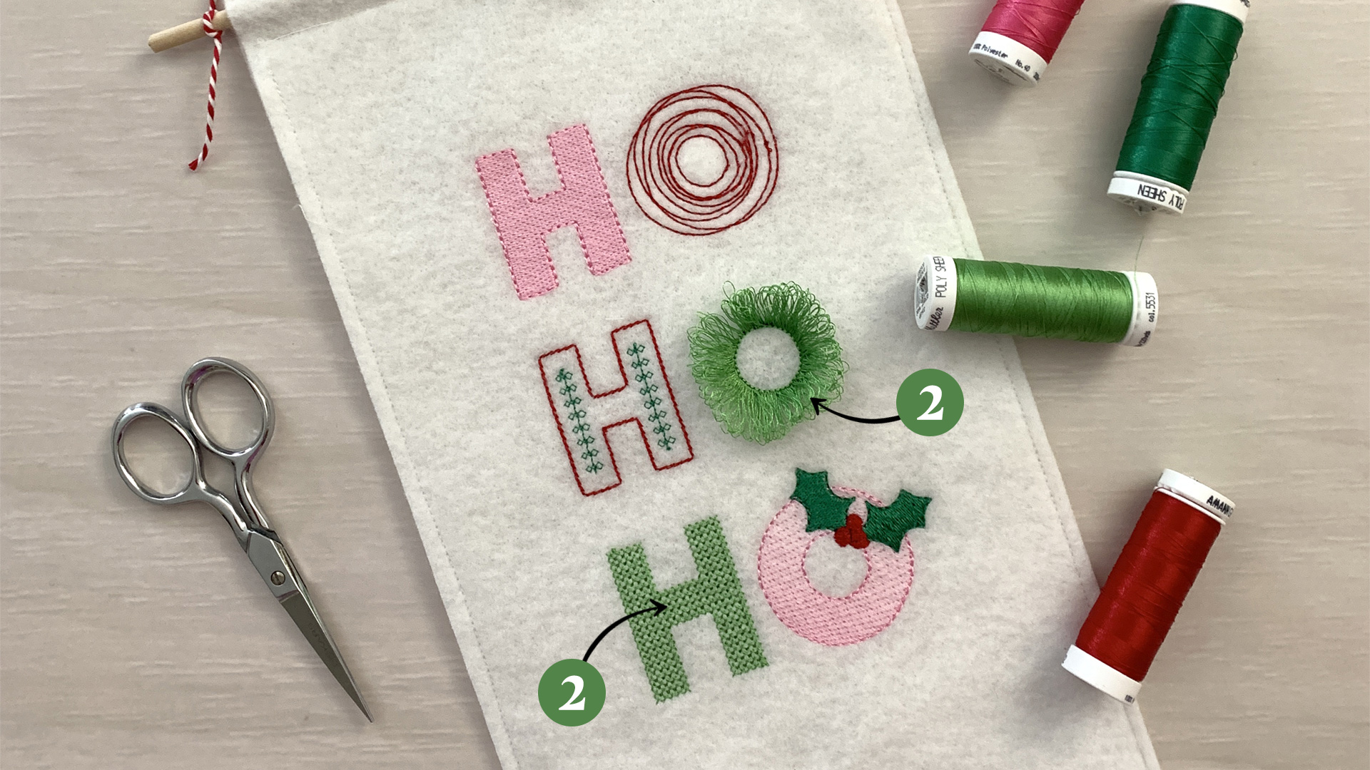 Stitch run two creates the middle O and bottom H.