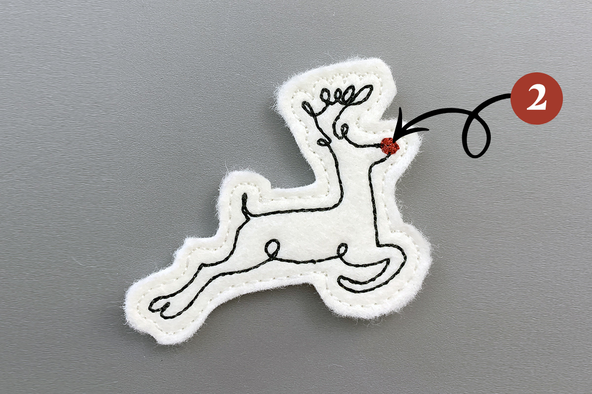 Callout indicating the second color in the machine embroidery sequence is red.