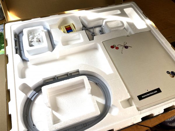 Opening the box with the embroidery unit for the B 790 Plus