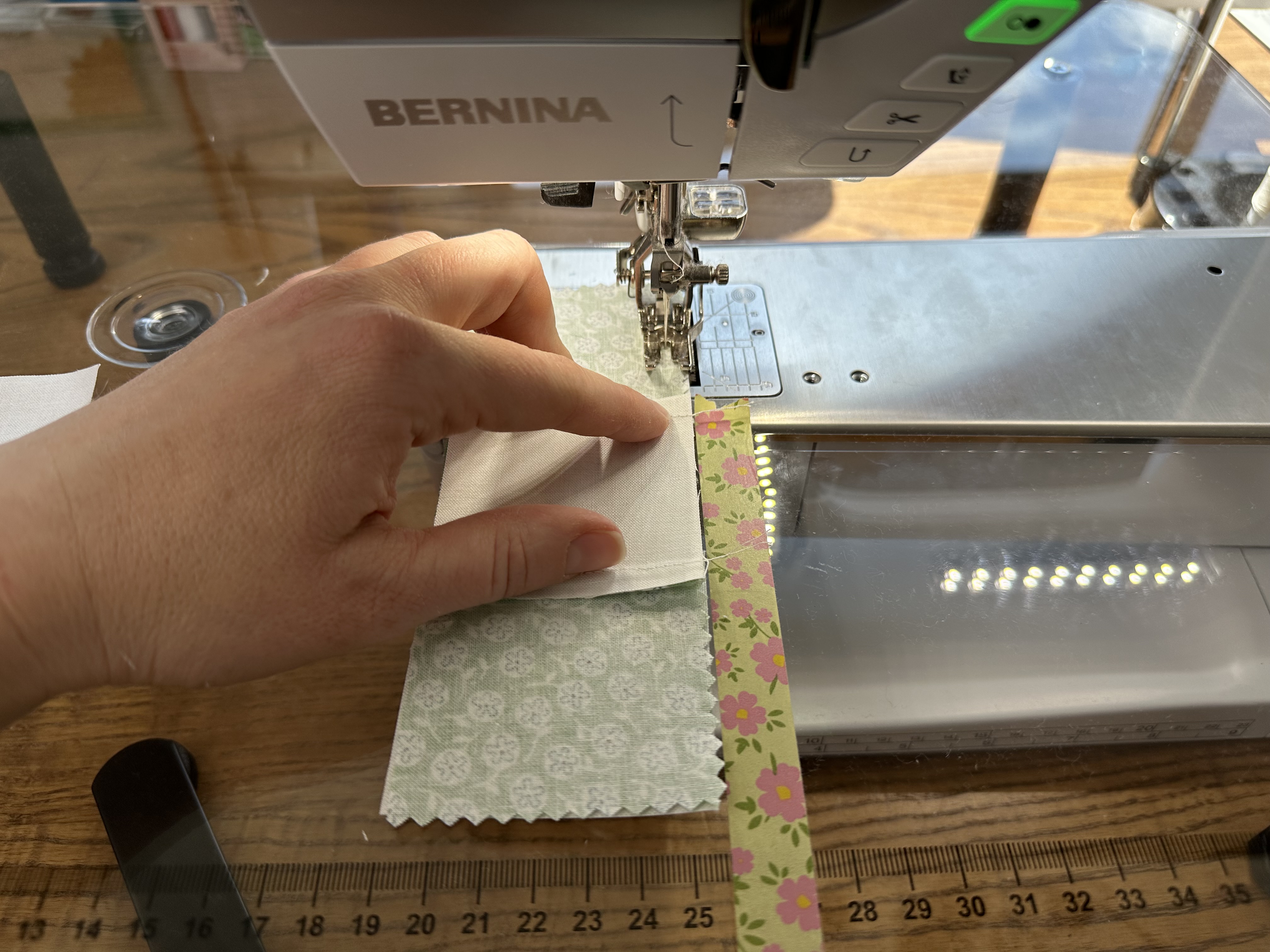 Assembling the rows of a Nine Patch for the Nona Quilt Along BERNINA WeAllSew blog
