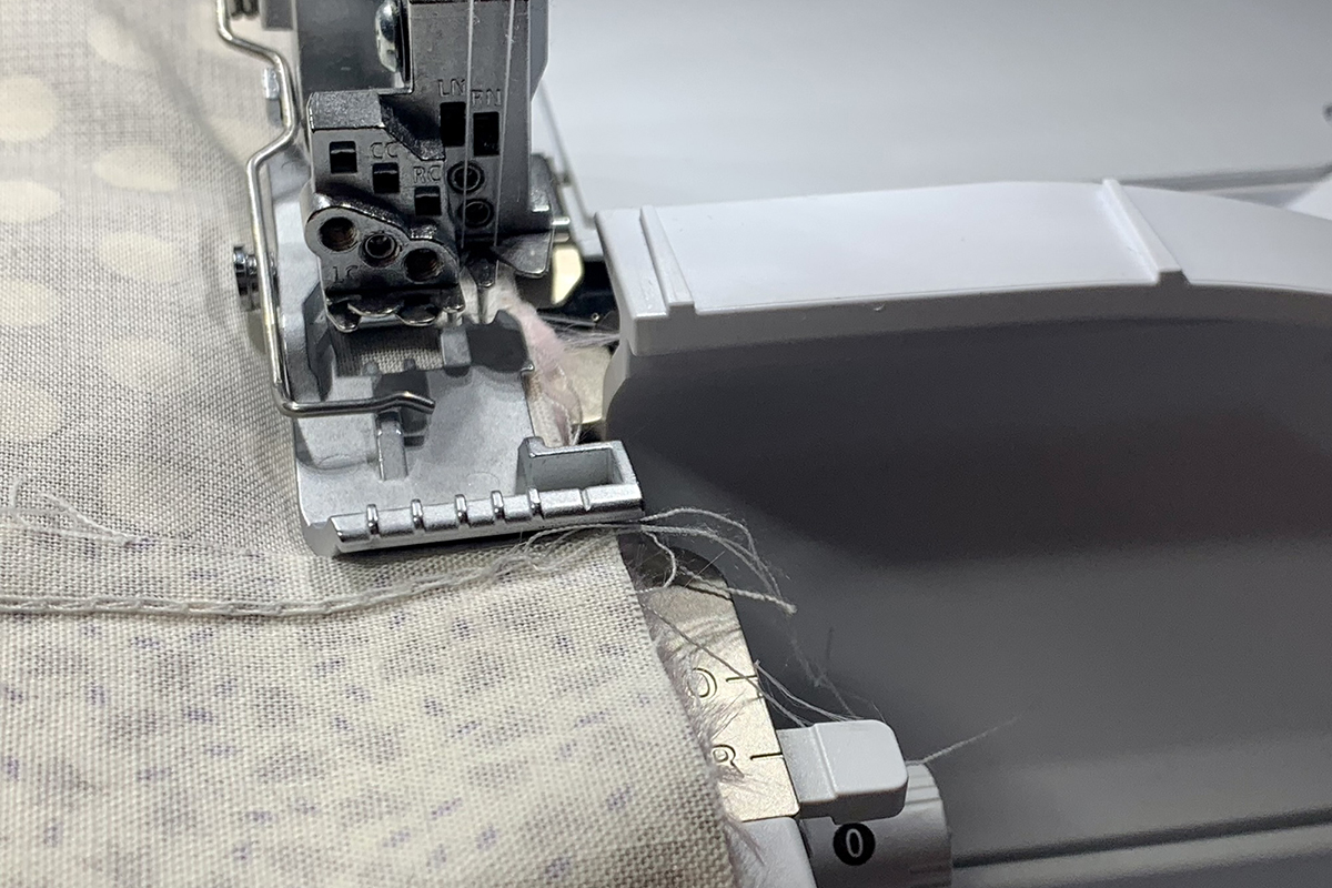 Serger_Baby_Quilt_#2_Post_19_close_up_of_foot_marking_BERNINA_WeAllSew_Blog_1200x800px