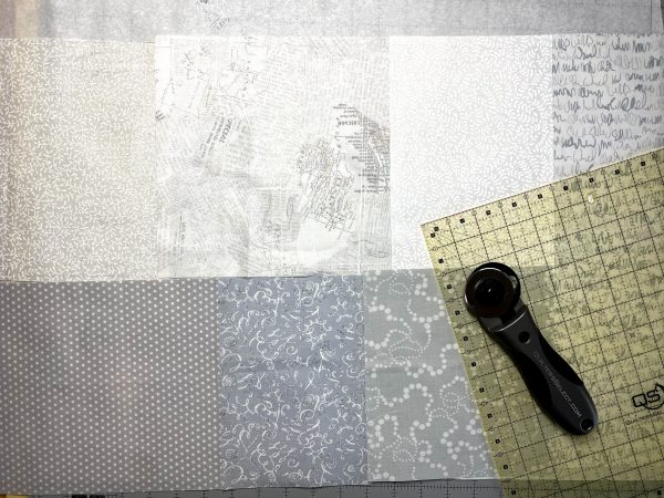 Background fabrics cut and ready to be stitched.