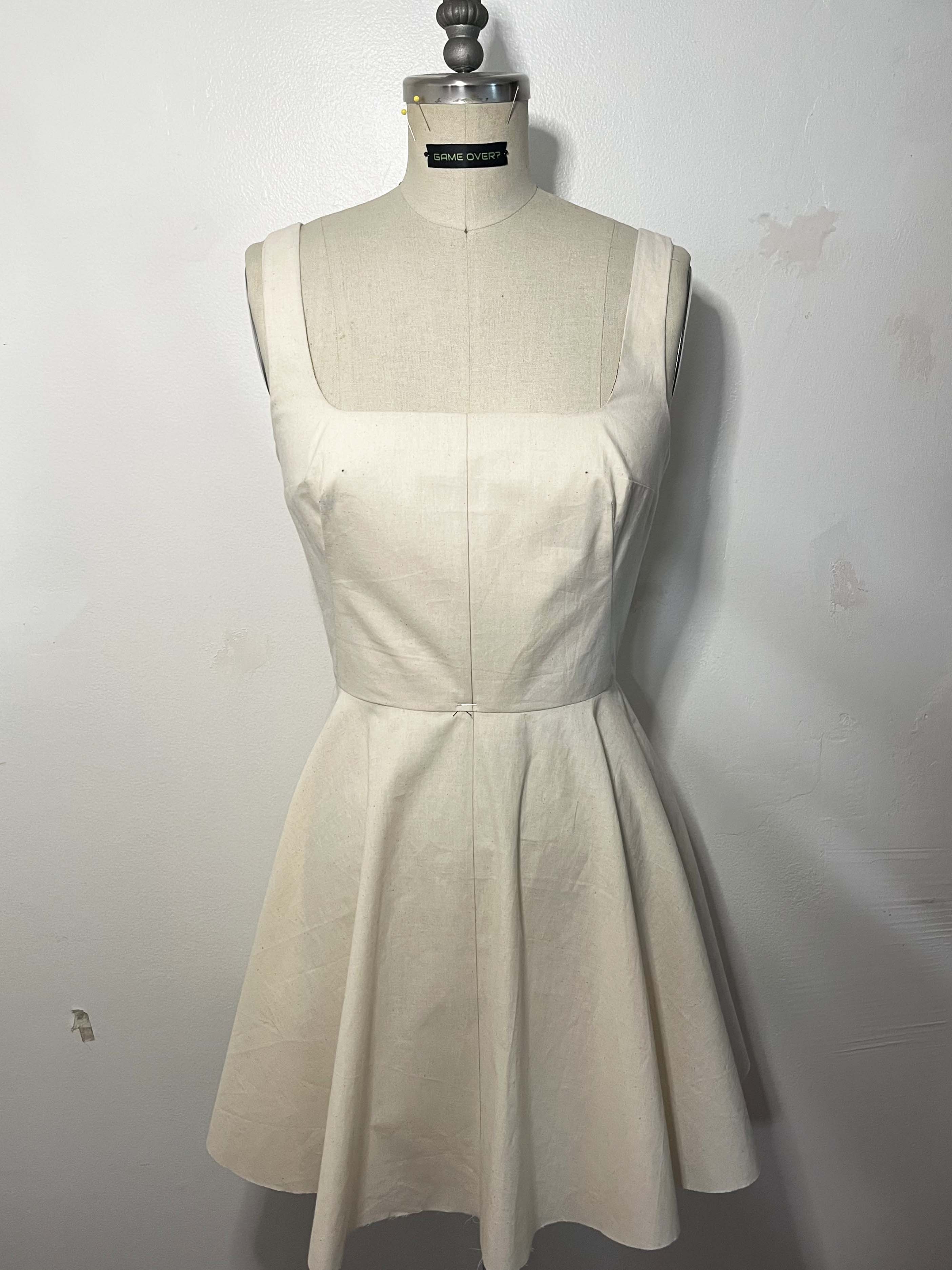 Fit Sample from Draping on a Dress Form.