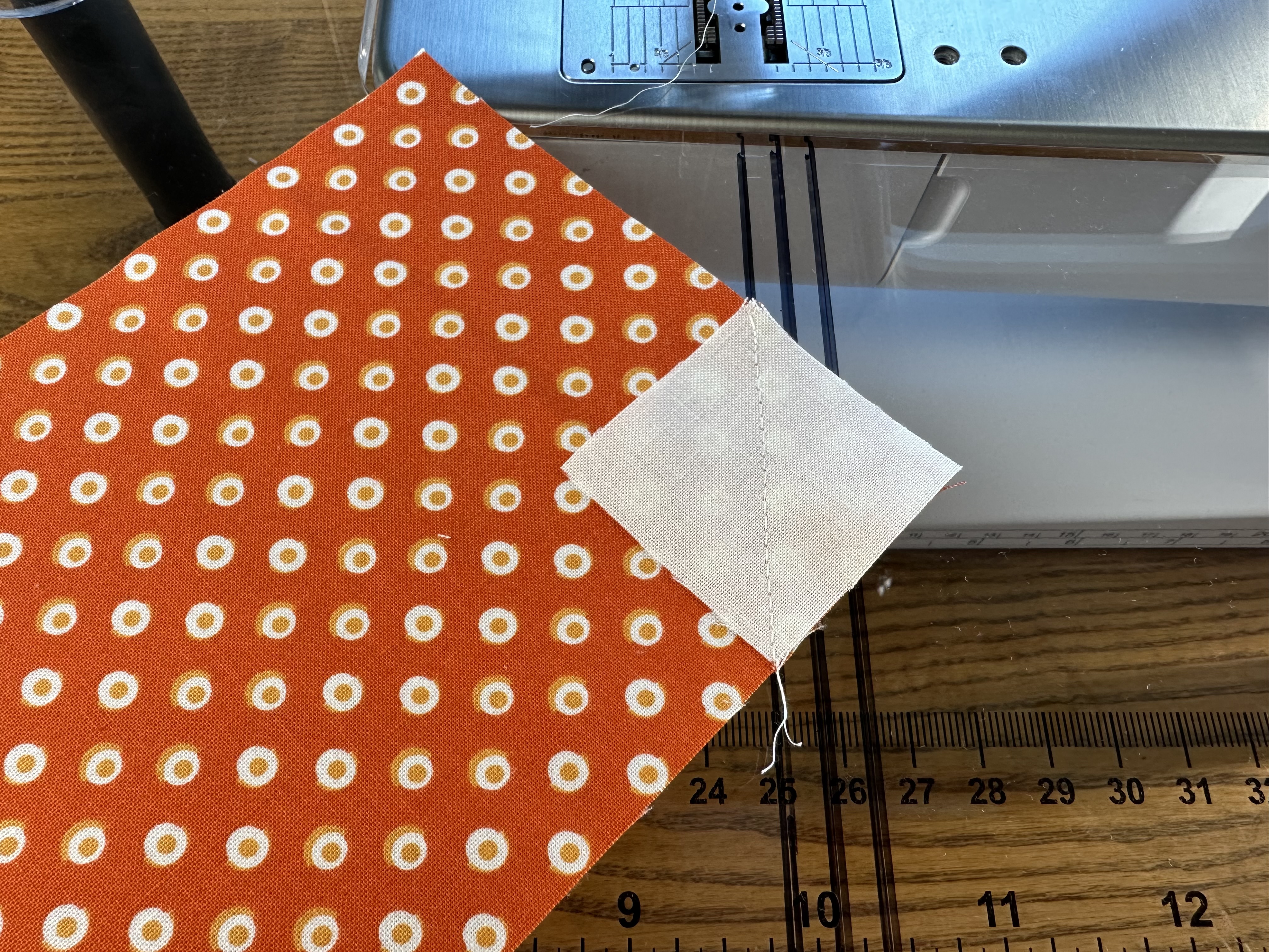 Seam Line of an Easy Corner Triangle for a Pumpkin Block from Onyx in Autumn Table Runner