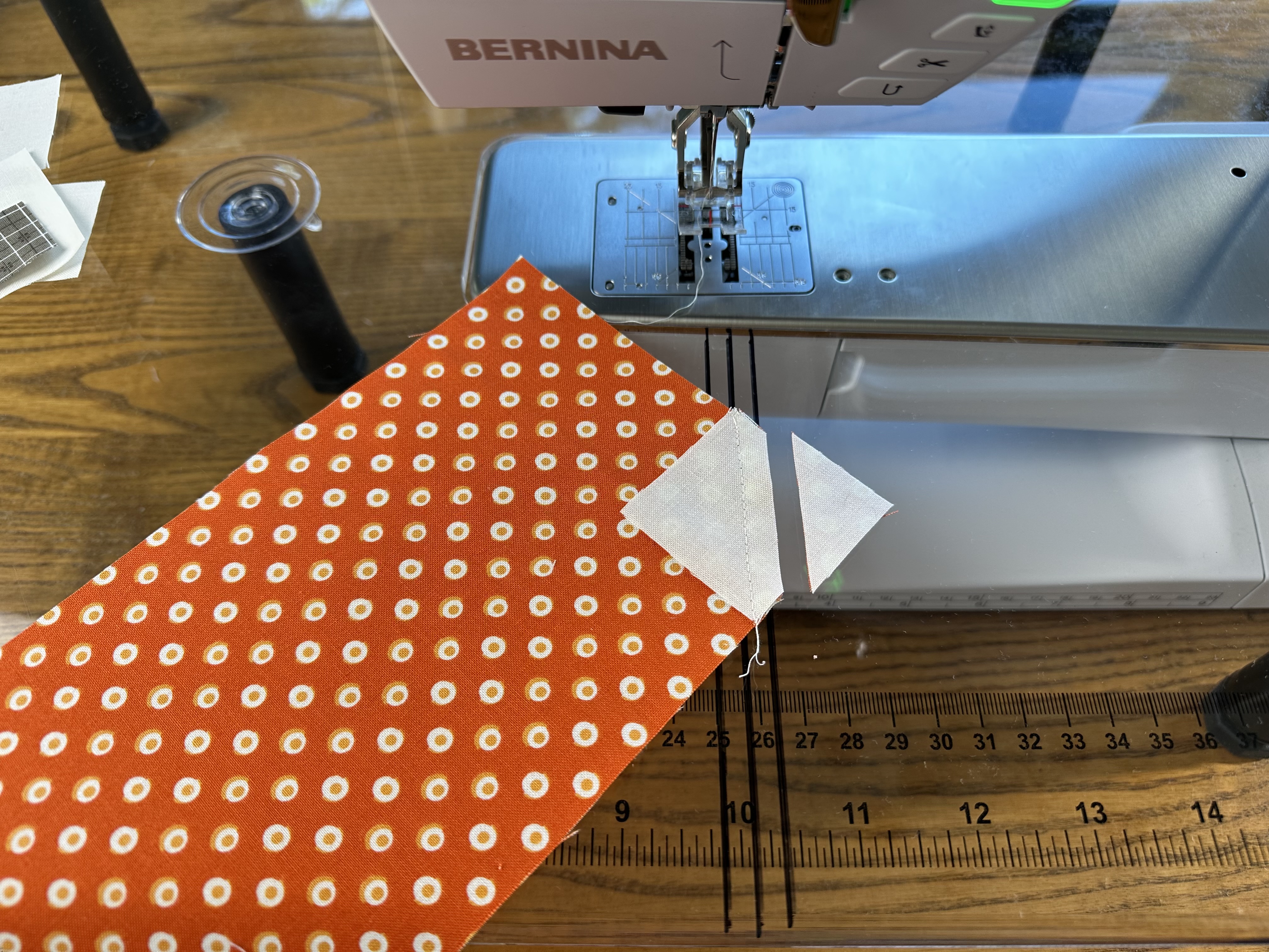 Trimming an Easy Corner Triangle for a Pumpkin Block from Onyx in Autumn Table Runner